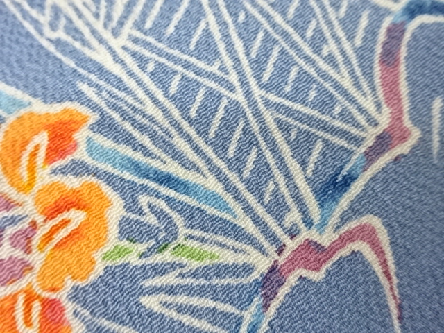  縮緬地柴垣に流水・草花模様名古屋帯